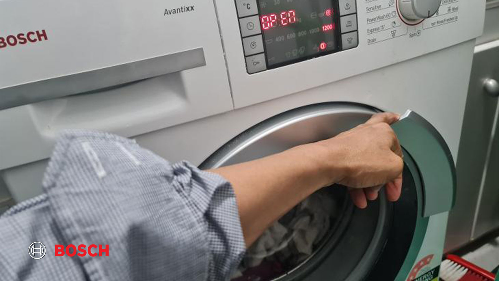 علت باز نشدن درب ماشین لباسشویی بوش
