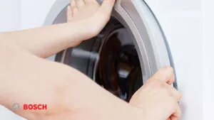 10 علت رایج باز نشدن درب ماشین لباسشویی بوش